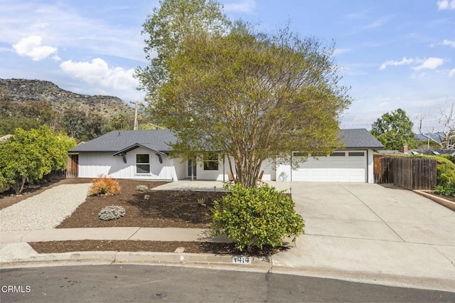 1414 Meadowbrook Rd, Ojai, CA 93023 - view of front of property featuring driveway, fence, a garage, and a mountain view