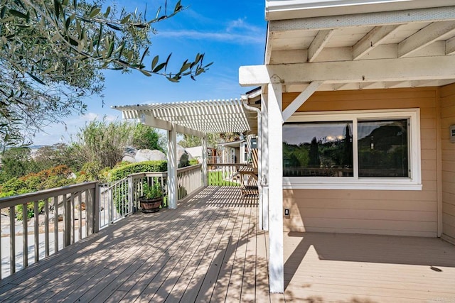 wooden deck with a pergola