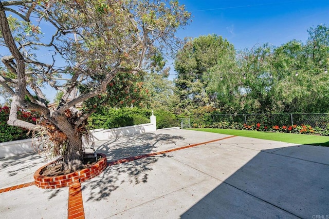 view of patio with fence