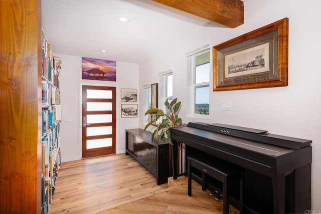 entrance foyer featuring a wealth of natural light, light wood-style flooring, and recessed lighting