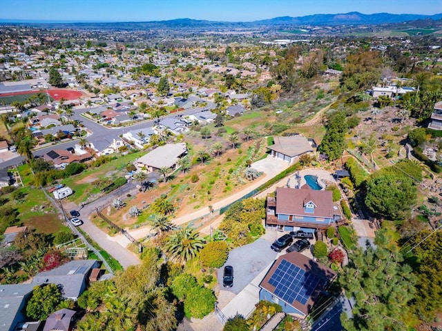 bird's eye view with a mountain view and a residential view