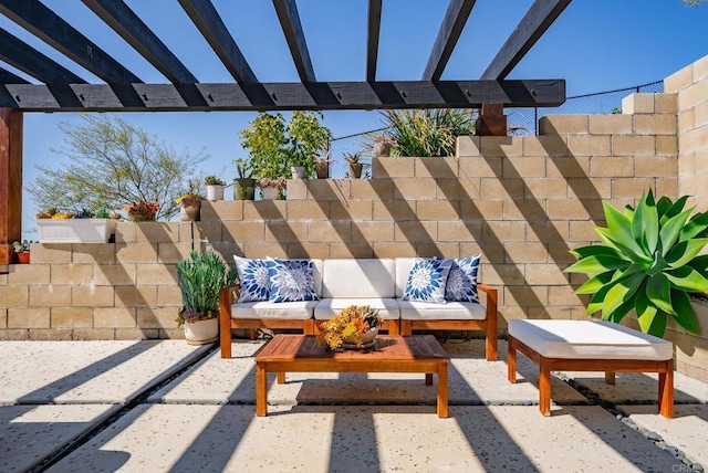 view of patio with outdoor lounge area, a pergola, and fence