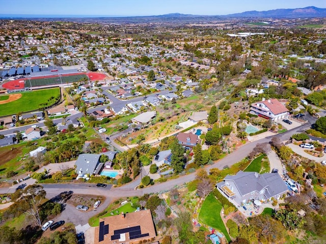 bird's eye view featuring a residential view and a mountain view