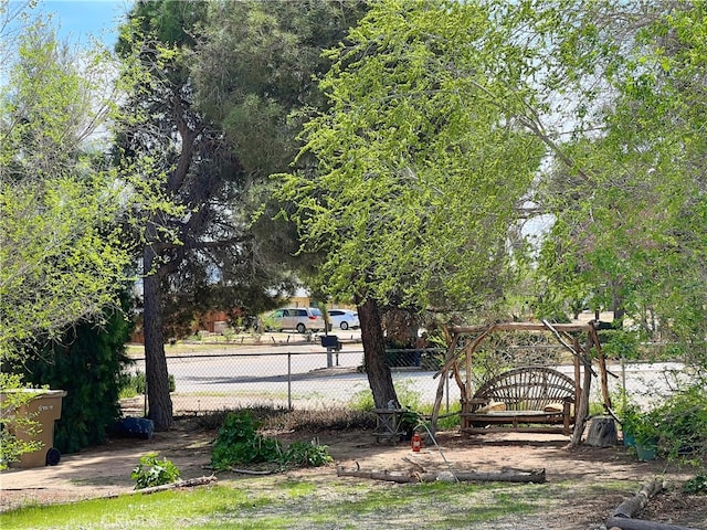 view of yard featuring fence