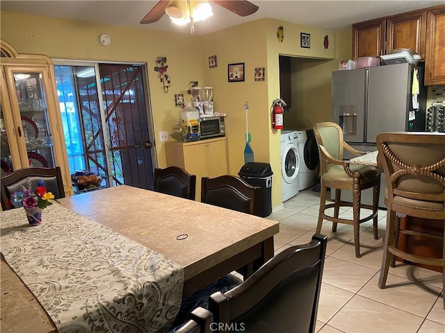 698 W Phillips Blvd, Pomona, CA 91766 - interior space featuring appliances with stainless steel finishes, light tile patterned flooring, washing machine and dryer, and ceiling fan