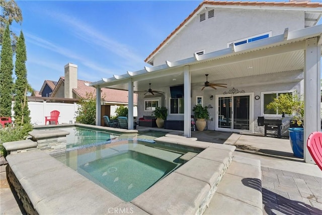3140 Timberline Dr, Corona, CA 92882 - view of pool featuring a patio, ceiling fan, a pool with connected hot tub, and fence
