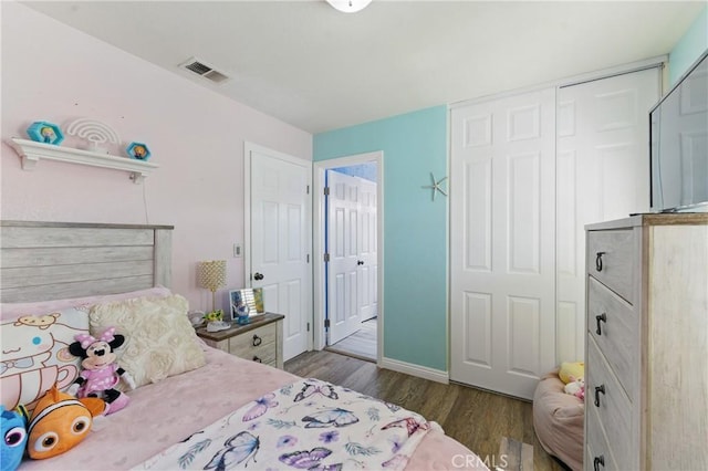 3140 Timberline Dr, Corona, CA 92882 - bedroom with visible vents, a closet, baseboards, and wood finished floors