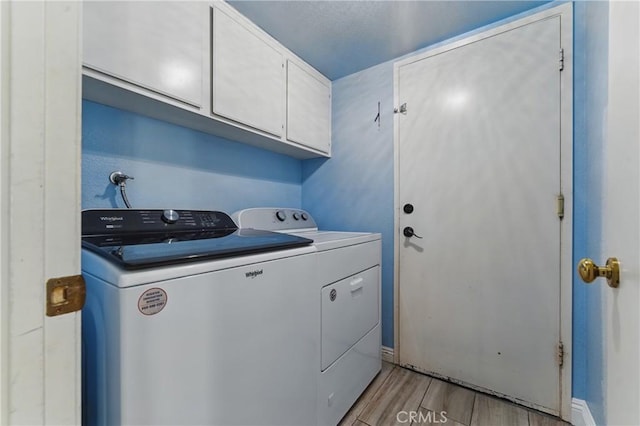 3140 Timberline Dr, Corona, CA 92882 - washroom with independent washer and dryer, wood finish floors, and cabinet space