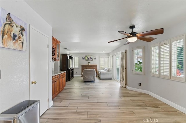 3140 Timberline Dr, Corona, CA 92882 - bedroom with baseboards, ceiling fan, and wood finish floors