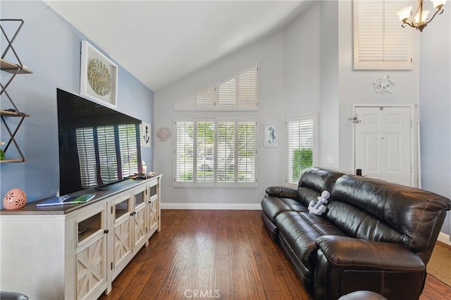 3140 Timberline Dr, Corona, CA 92882 - living room featuring a chandelier, high vaulted ceiling, baseboards, and dark wood finished floors