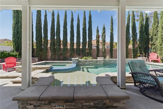3140 Timberline Dr, Corona, CA 92882 - view of swimming pool featuring a fenced backyard, a pool with connected hot tub, and a patio