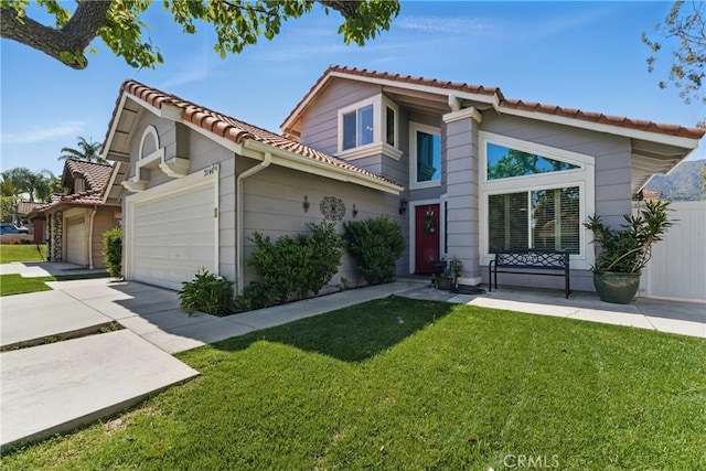 3140 Timberline Dr, Corona, CA 92882 - mediterranean / spanish house with driveway, a tile roof, an attached garage, and a front lawn