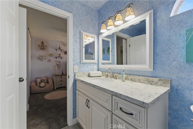 3140 Timberline Dr, Corona, CA 92882 - bathroom featuring vanity and wallpapered walls