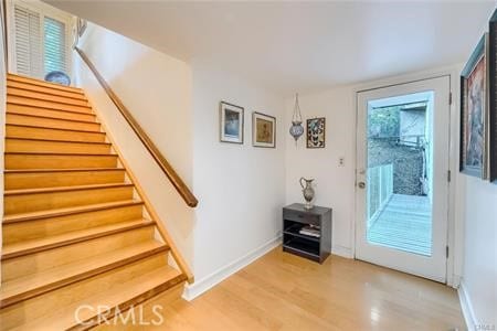 21651 Yucatan Ave, Woodland Hills, CA 91364 - stairs with wood finished floors and baseboards