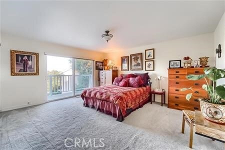 21651 Yucatan Ave, Woodland Hills, CA 91364 - bedroom featuring access to exterior and carpet flooring