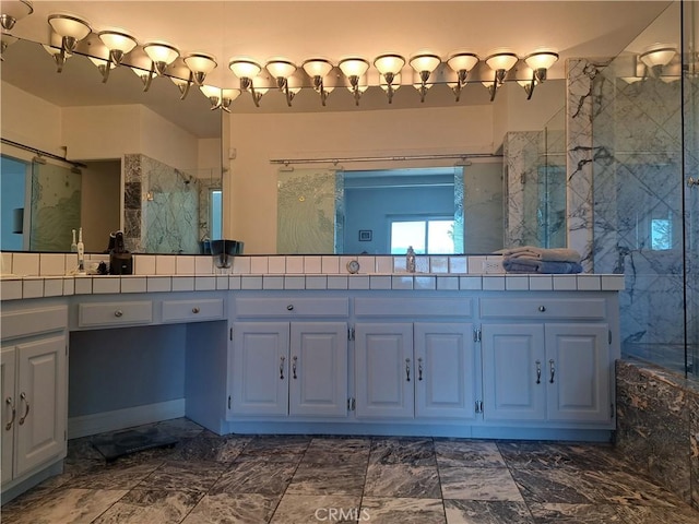 21651 Yucatan Ave, Woodland Hills, CA 91364 - bathroom featuring a marble finish shower and double vanity