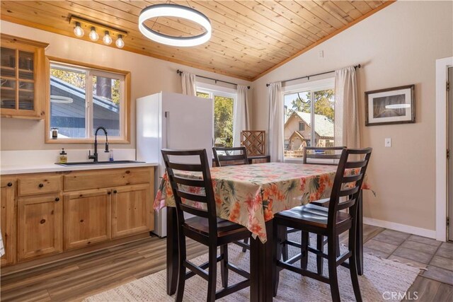 196 Sunset Ln, Sugarloaf, CA 92386 - dining area featuring vaulted ceiling, wood ceiling, and baseboards