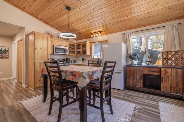 196 Sunset Ln, Sugarloaf, CA 92386 - dining area featuring lofted ceiling, wood ceiling, wood finished floors, and baseboards