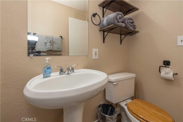 196 Sunset Ln, Sugarloaf, CA 92386 - bathroom with toilet and a sink