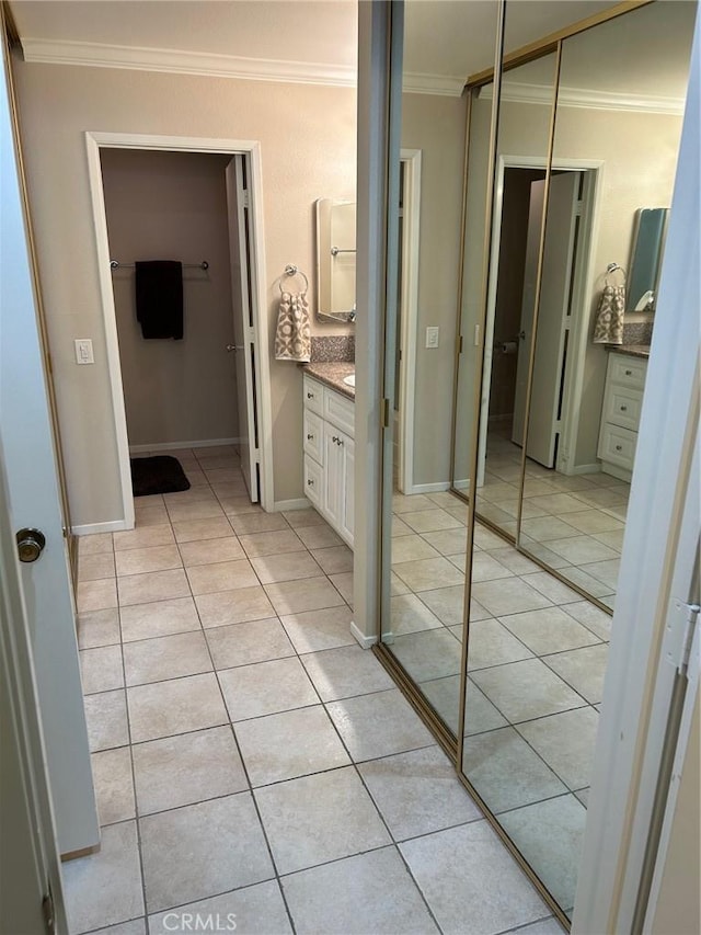2370 Via Mariposa W Unit 1B, Laguna Woods, CA 92637 - bathroom with crown molding, vanity, and tile patterned floors