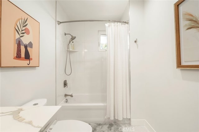 full bath featuring shower / tub combo and toilet