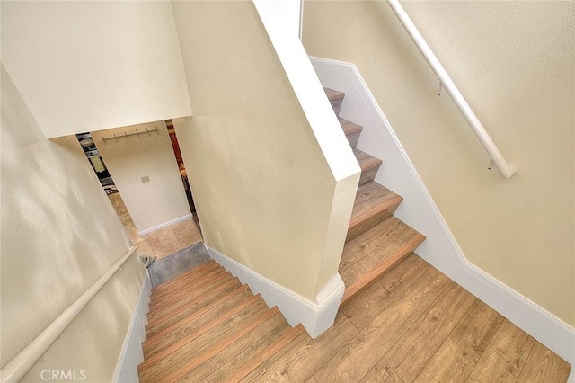 4018 W 5th St Unit J, Santa Ana, CA 92703 - stairs with baseboards and wood finished floors