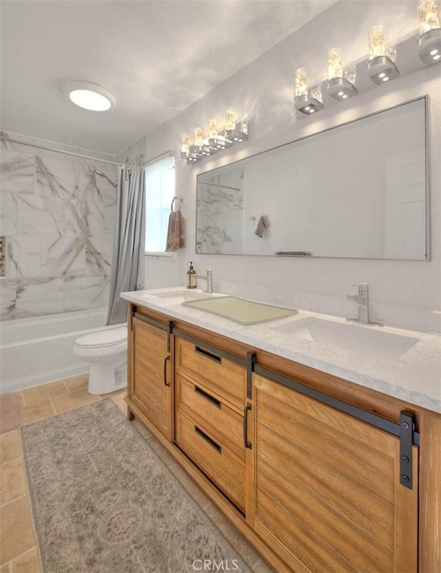 4018 W 5th St Unit J, Santa Ana, CA 92703 - bathroom featuring shower / bath combo with shower curtain, a sink, double vanity, and toilet