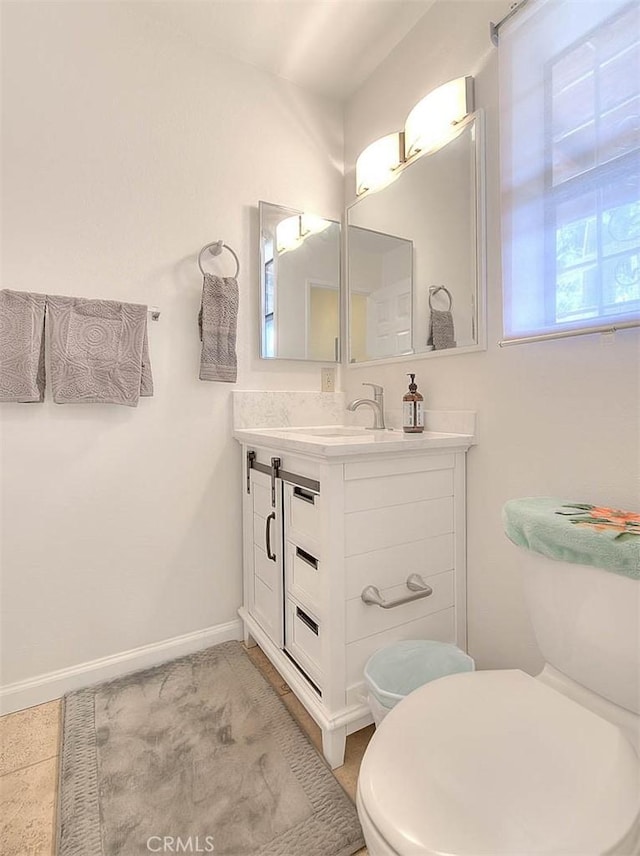 4018 W 5th St Unit J, Santa Ana, CA 92703 - half bath with toilet, vanity, and baseboards