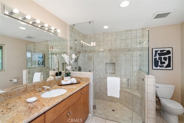 2377 Silver Ridge Ave, Los Angeles, CA 90039 - full bath with toilet, a shower stall, vanity, tile patterned floors, and recessed lighting