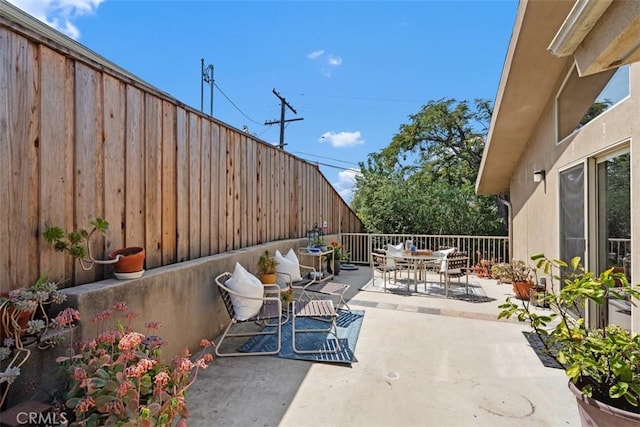 2377 Silver Ridge Ave, Los Angeles, CA 90039 - fenced backyard with outdoor dining space and a patio