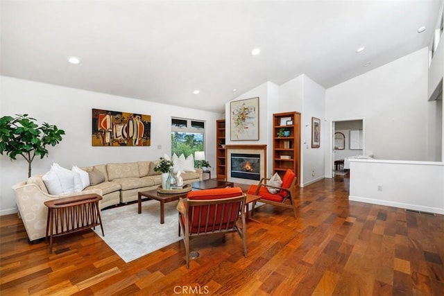 2377 Silver Ridge Ave, Los Angeles, CA 90039 - living area featuring wood finished floors, a tile fireplace, high vaulted ceiling, and recessed lighting