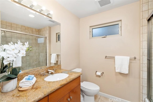 2377 Silver Ridge Ave, Los Angeles, CA 90039 - bathroom featuring a tile shower, tile patterned floors, vanity, and toilet