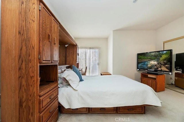 bedroom with light carpet