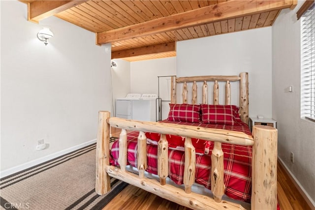 212 Vista Ln, Sugarloaf, CA 92386 - bedroom featuring wooden ceiling, beam ceiling, baseboards, and washing machine and dryer
