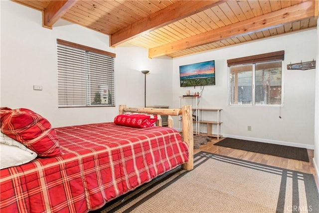 212 Vista Ln, Sugarloaf, CA 92386 - bedroom with baseboards, wood finished floors, beam ceiling, and wood ceiling