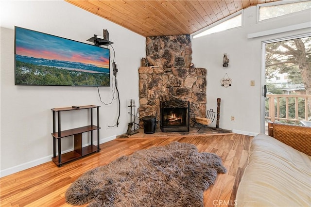 212 Vista Ln, Sugarloaf, CA 92386 - living area with a fireplace, wood ceiling, vaulted ceiling, and wood finished floors