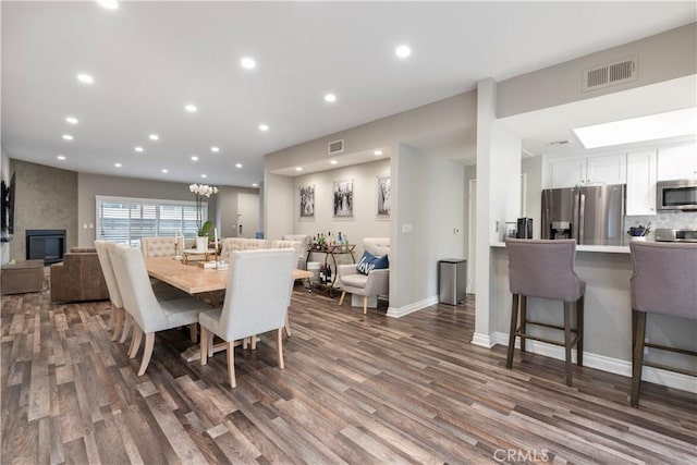 14919 Dickens St Unit 104, Sherman Oaks, CA 91403 - dining space with wood finished floors and recessed lighting