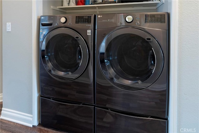 14919 Dickens St Unit 104, Sherman Oaks, CA 91403 - washroom with washing machine and clothes dryer and wood finished floors