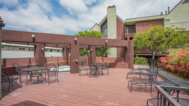 deck with outdoor dining space