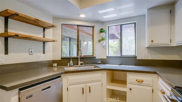 kitchen with open shelves, a sink, dishwasher, and white cabinets