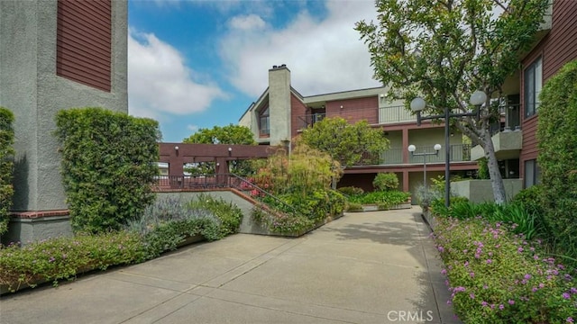 view of property's community featuring a patio