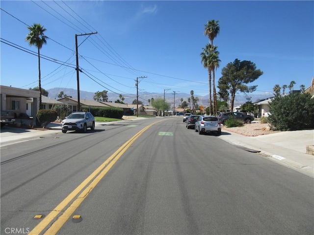 view of street with curbs and sidewalks