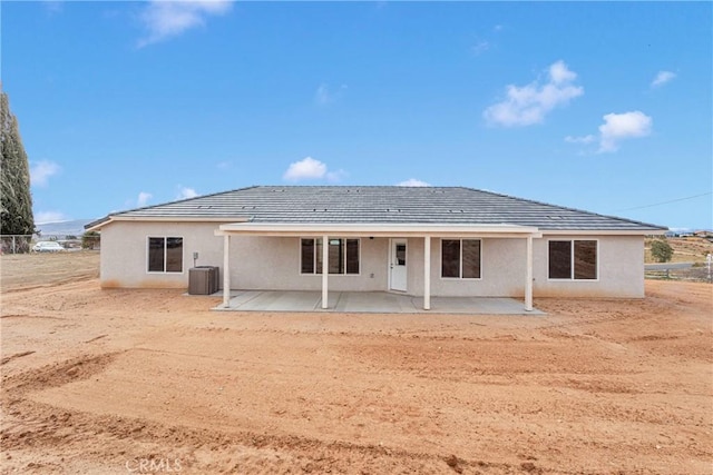 18420 Wisteria St, Hesperia, CA 92345 - rear view of property featuring a patio, central AC unit, and stucco siding