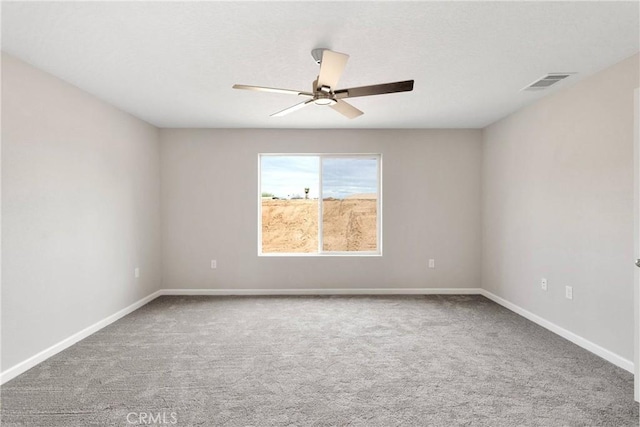 18420 Wisteria St, Hesperia, CA 92345 - unfurnished room featuring a textured ceiling, visible vents, carpet, baseboards, and a ceiling fan