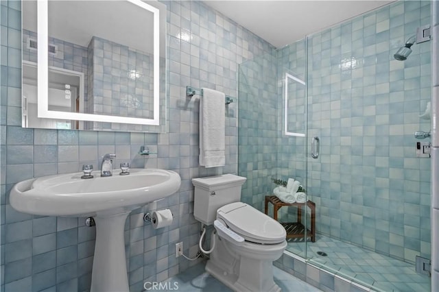 3332 Alabama Cir, Costa Mesa, CA 92626 - bathroom with tile walls, a shower stall, and toilet