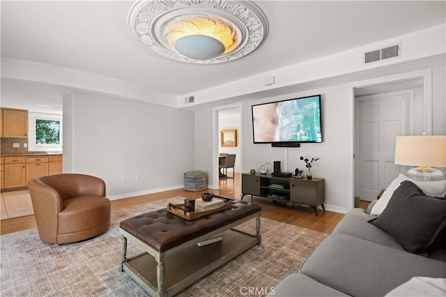 3332 Alabama Cir, Costa Mesa, CA 92626 - living room with light wood-style flooring and baseboards