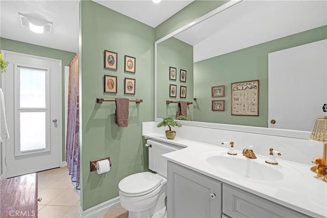 3118 N Hartman St, Orange, CA 92865 - full bathroom with tile patterned floors, toilet, baseboards, and vanity