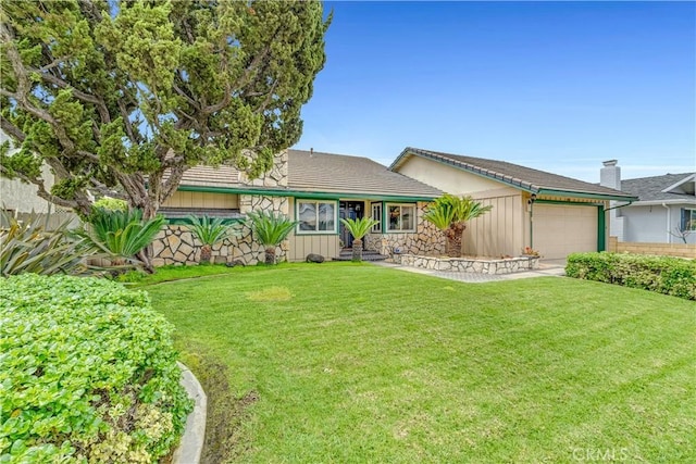 single story home featuring an attached garage, a tile roof, stone siding, and a front lawn