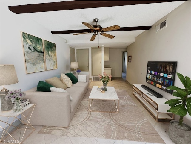 tiled living area with beam ceiling, a ceiling fan, and visible vents
