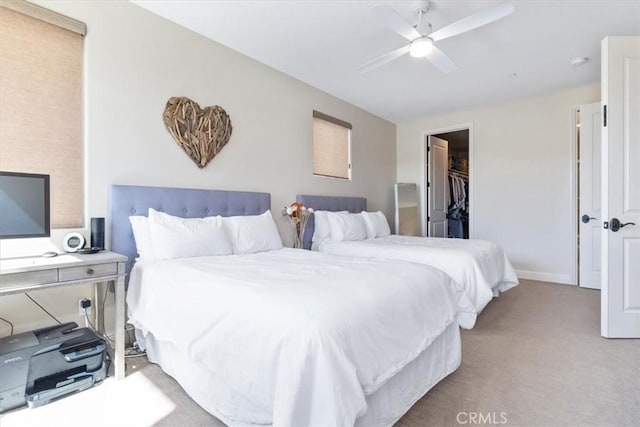2865 Rock Wren Ln, Avila Beach, CA 93424 - bedroom with carpet, a walk in closet, a ceiling fan, a closet, and baseboards